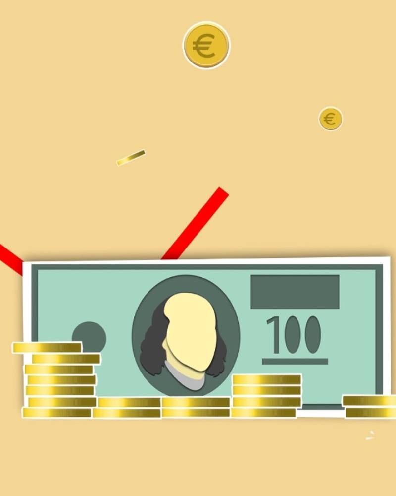 Un billet de banque avec des pièces